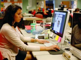 Woman Working in Missourian Newsroom