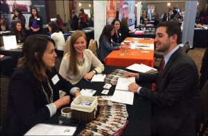 Ali Greco, manager of strategic planning and Mary Sue Kiso, associate project manager at Brado Creative Insight chat with Strategic Communication student Kai Bressler.