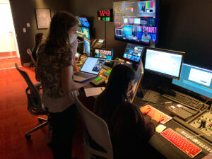 Hope Beitchman of Boerne, Texas, and Victoria Alaniz of Montclair, California -- both second-year master's students -- produce KOMU-TV's streaming program on Election Night. The experimental program originated from RJI's TV studio at the J-School and was seen on komu.com, the KOMU app, Apple TV and Roku. Photo by Nate Brown | © 2020 - Curators of the University of Missouri