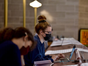 Senior Caitlin King types notes while covering a May 5 session of the Missouri House of Representatives.