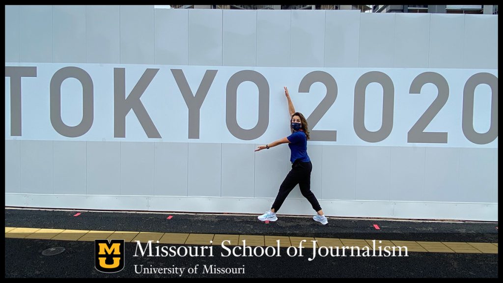 Cassidy Herring in front of Tokyo 2020 banner