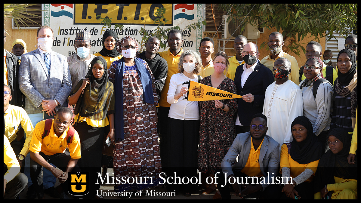 Kathy Kiely, Kathryn Lucchesi and Stacey Woelfel pose with students from Columbia, Mo. (Feb. 7, 2022) — Surrounded by a distinctive pattern of striped sub-Saharan vegetation known as “tiger bush,” Niamey, the capital city of Niger and the country’s largest city, is home to the Institut de Formation aux Technologies de l'Information et de la Communication (IFTIC), a school in Niger that trains students in journalism, video production, and other communication skills