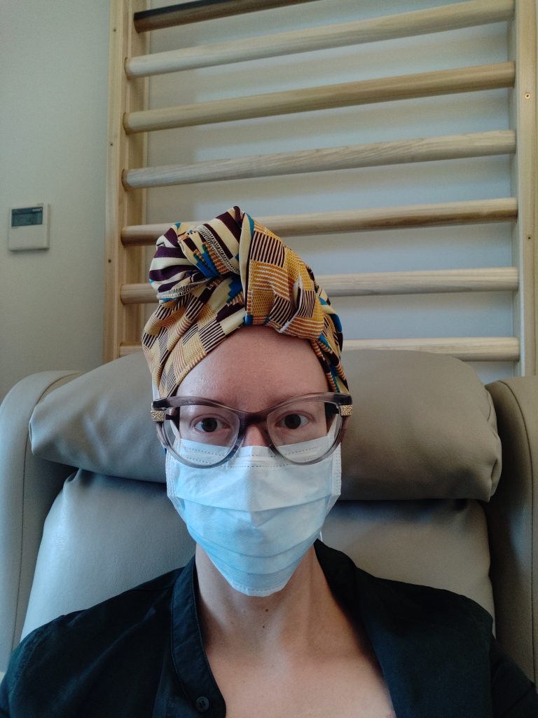 Self-portrait with mask at chemotherapy. Photo: Laura Gray, Gibraltar