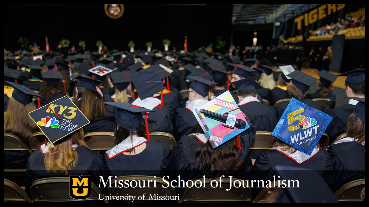 J-School graduates attend commencement with mortorboards decorated with where they will be working.