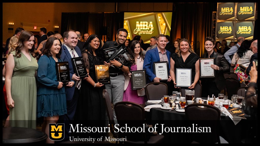 The KOMU 8 team displays the plaques awarded for their wins at Missouri Broadcasters Association awards ceremony on June 1.
