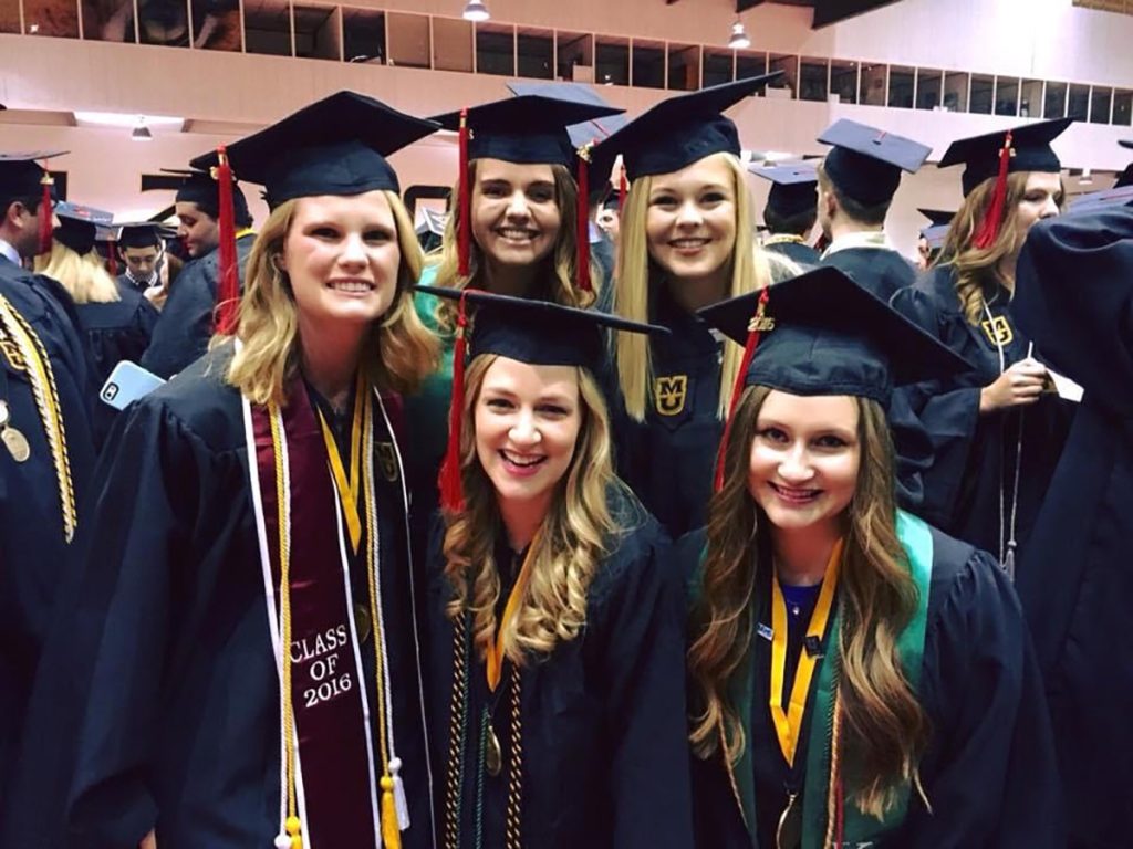 Erika Trombley and friends at her graduation from the Missouri School of Journalism, 2016
