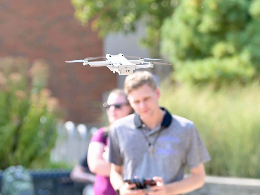 Lucas Johnson, a student at the Missouri School of Journalism, learns to control a drone during the Drone Journalism class taught by Dominick Lee. Photo: Nate Brown