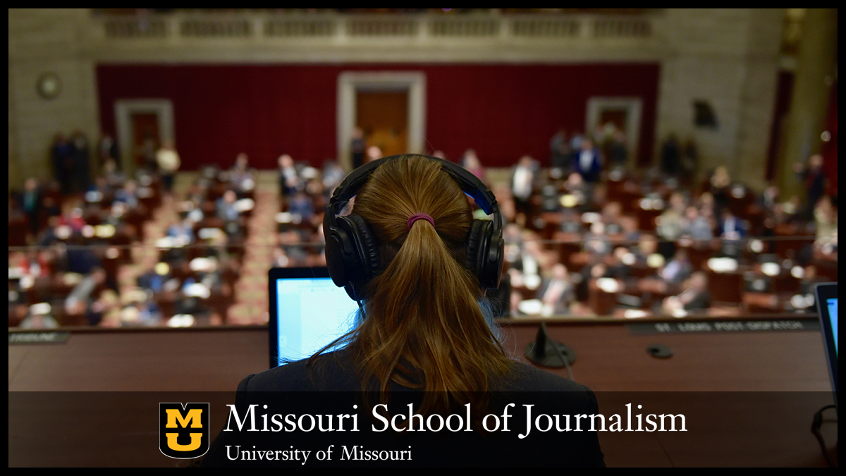 Student in the Missouri Statehouse legislative chamber