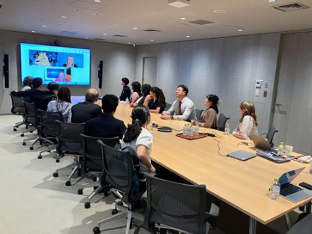 Students in McCann's Tokyo office await the announcement of the winning campaign.