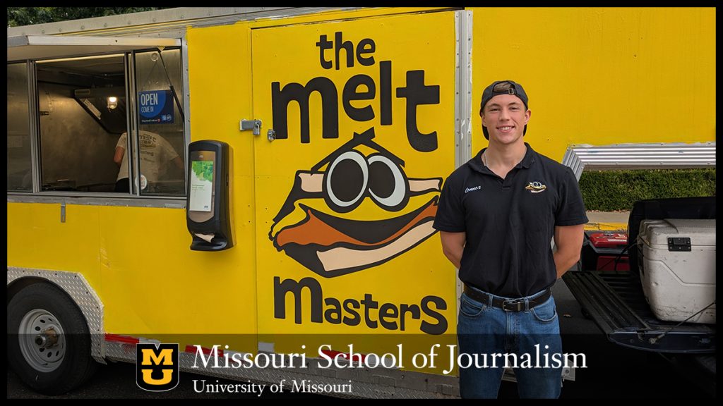 Connor McHugh standing in front of The Melt Masters food truck