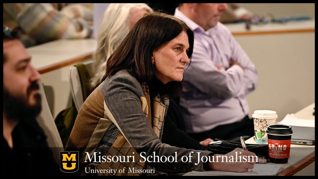 Jaime Sohosky takes notes during Team Aletheia's presentation. Photo: Nate Brown