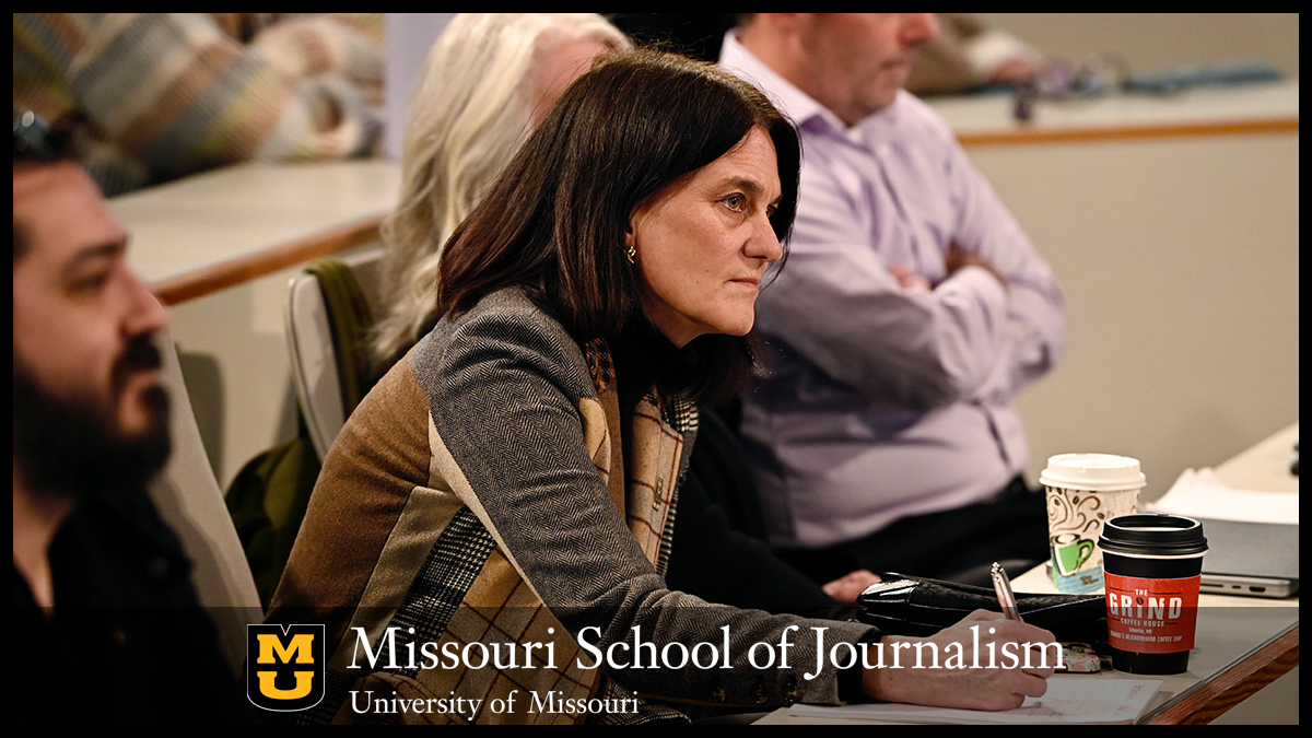 Jaime Sohosky takes notes during Team Aletheia's presentation. Photo: Nate Brown
