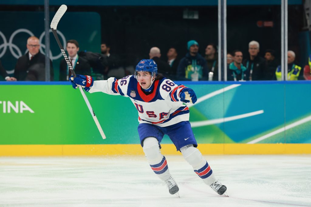 MILAN, ITALY - FEBRUARY 22: Jack Hughes #86 of Team United States celebrates scoring the game-winning goal in overtime during the Men's Gold Medal match between Canada and the United States on day 16 of the Milano Cortina 2026 Winter Olympic games at Milano Santagiulia Ice Hockey Arena on February 22, 2026 in Milan, Italy. Photo: Elsa Garrison | Getty Images