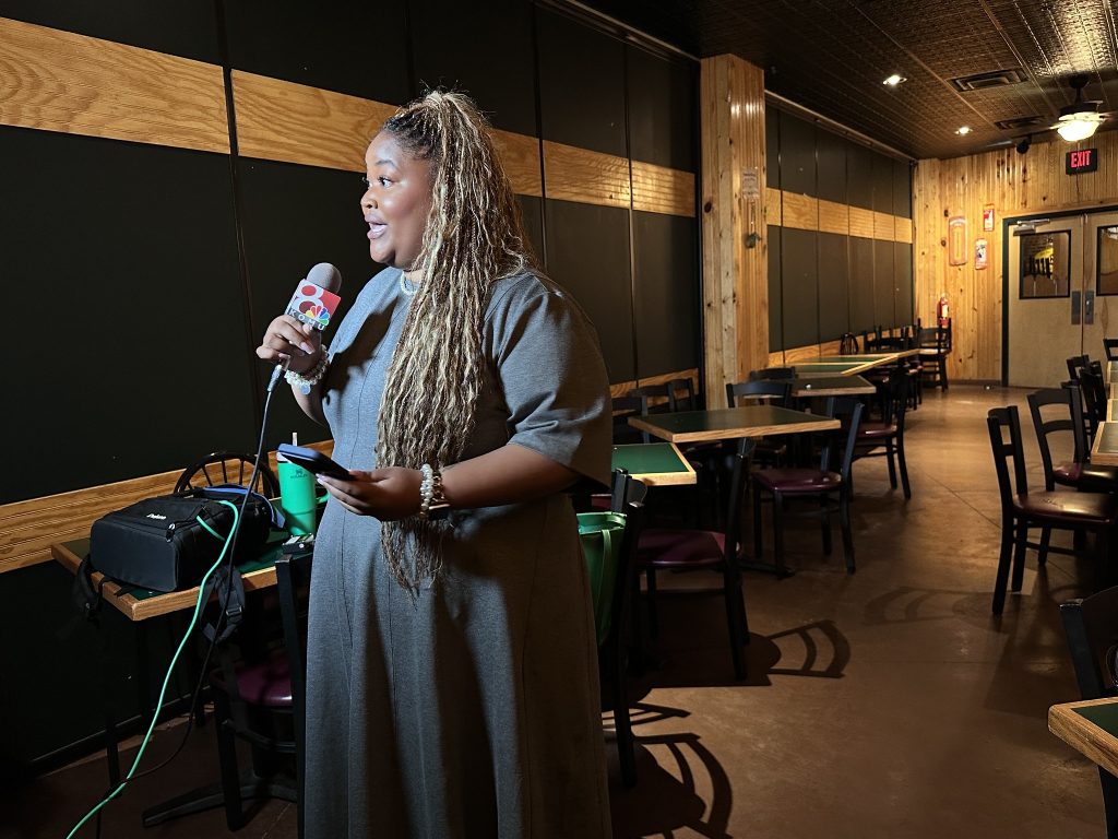 Senior Taylor Bowman reports live for KOMU-TV’s 10 p.m. newscast from the Taylor Burks for Congress watch party at Shakespeare’s Pizza South.