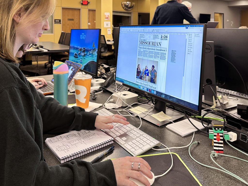 Kate Cassady, BJ ’26, designs the front page of the next day’s Columbia Missourian.