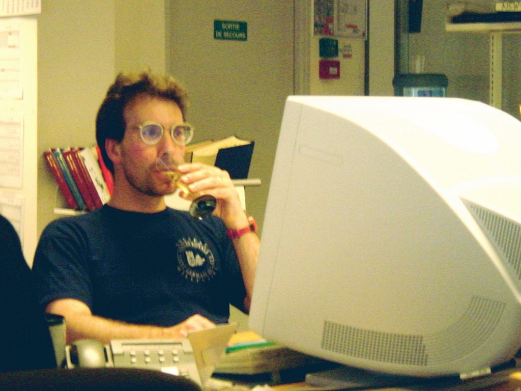 Robert Youngblood performing editing duties at the International Herald Tribune in Paris around the year 2000.
